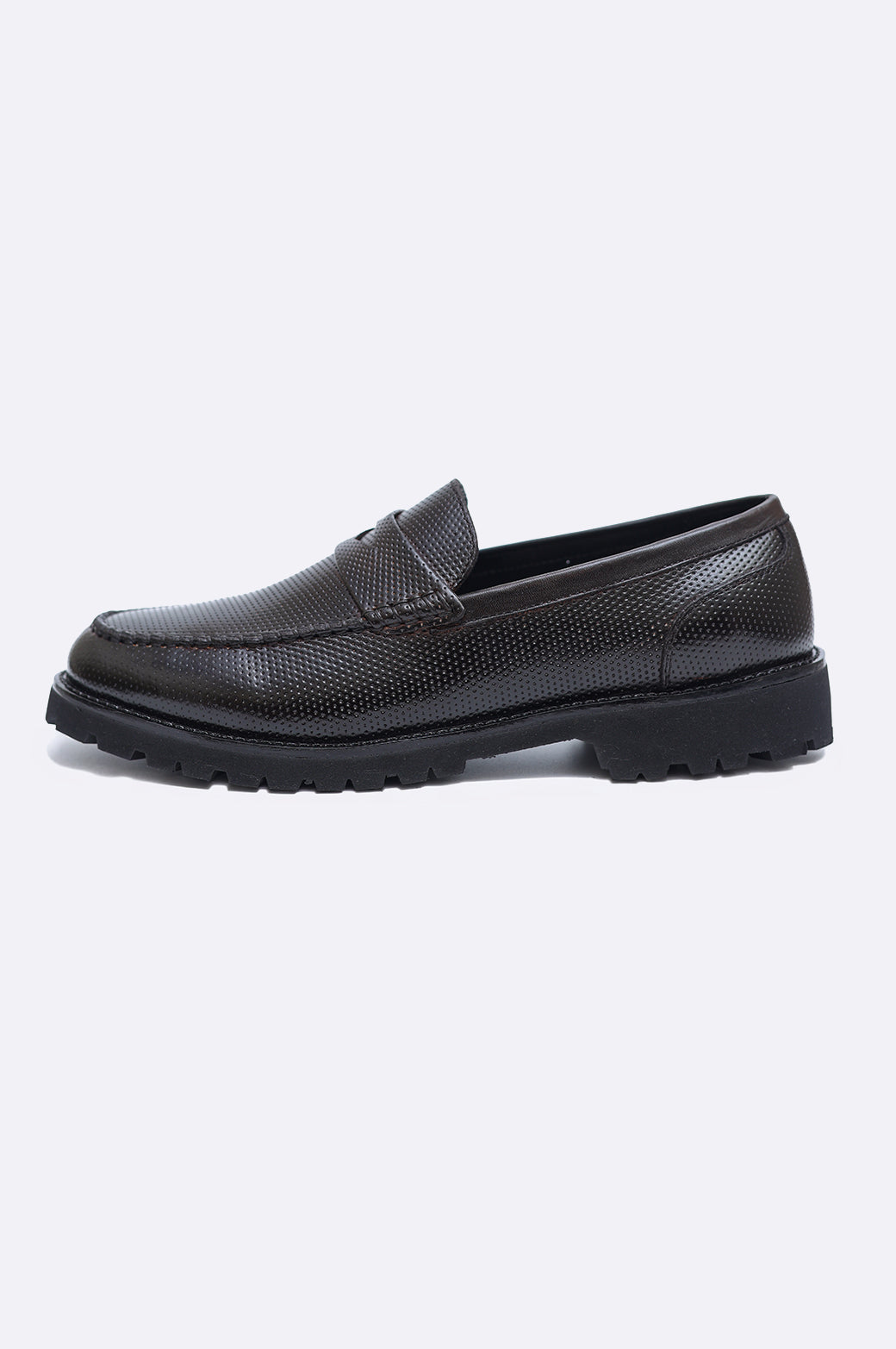 Pair of men's dark brown perforated leather penny loafers featuring a classic saddle strap and a thick black rugged lug sole.