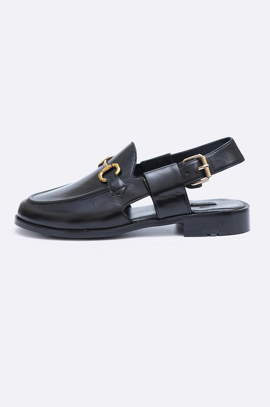 Pair of premium men's black leather closed-toe sandals with gold horsebit hardware and adjustable slingback heel straps.