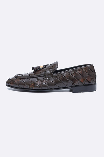 Pair of premium men's dark brown hand-woven leather loafers featuring twin tassels with gold-tone accents on a clean white background.