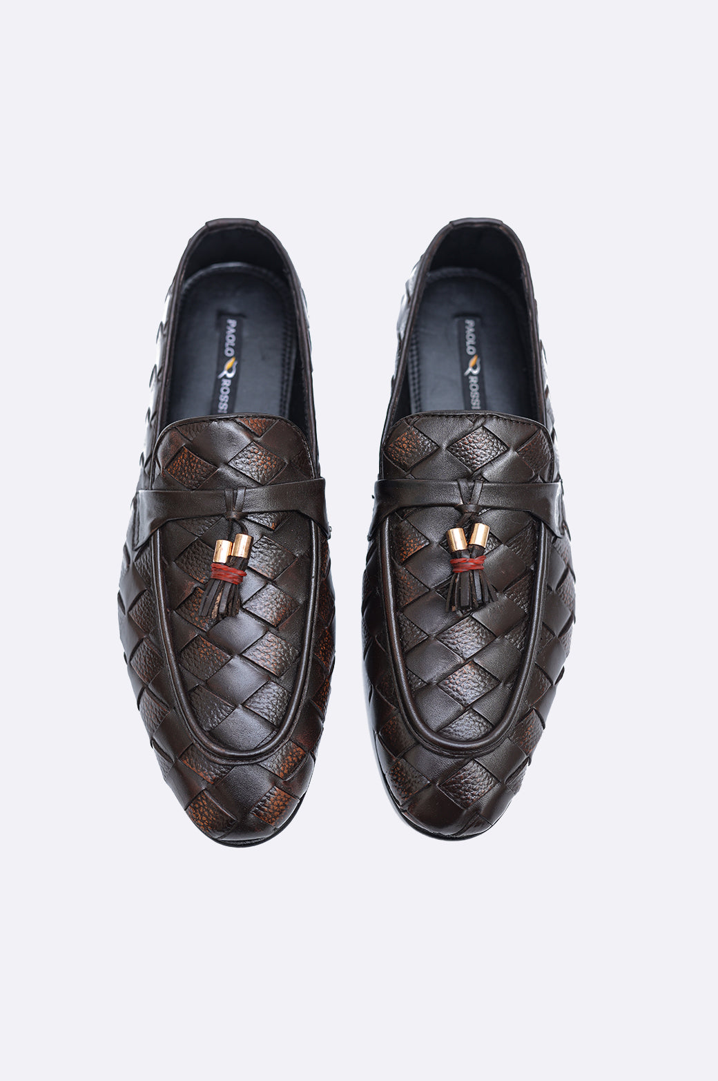 Pair of premium men's dark brown hand-woven leather loafers featuring twin tassels with gold-tone accents on a clean white background.